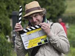 Režisér Jan Prušinovský s klapkou k filmu Okresní přebor (Lochovice, 10.8.2011)